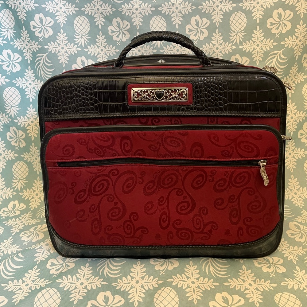 Brighton telescoping handle carry on suitcase. 19 pockets!!!